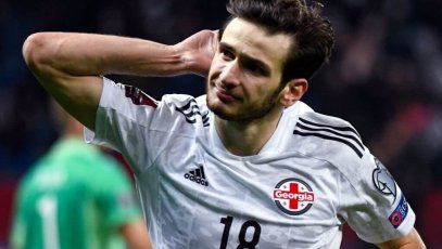 Georgia's midfielder Khvicha Kvaratskhelia celebrates after scoring the team's second goal during the FIFA World Cup Qatar 2022 qualification football match between Georgia and Sweden in Batumi on November 11, 2021. (Photo by Vano SHLAMOV / AFP) (Photo by VANO SHLAMOV/AFP via Getty Images)